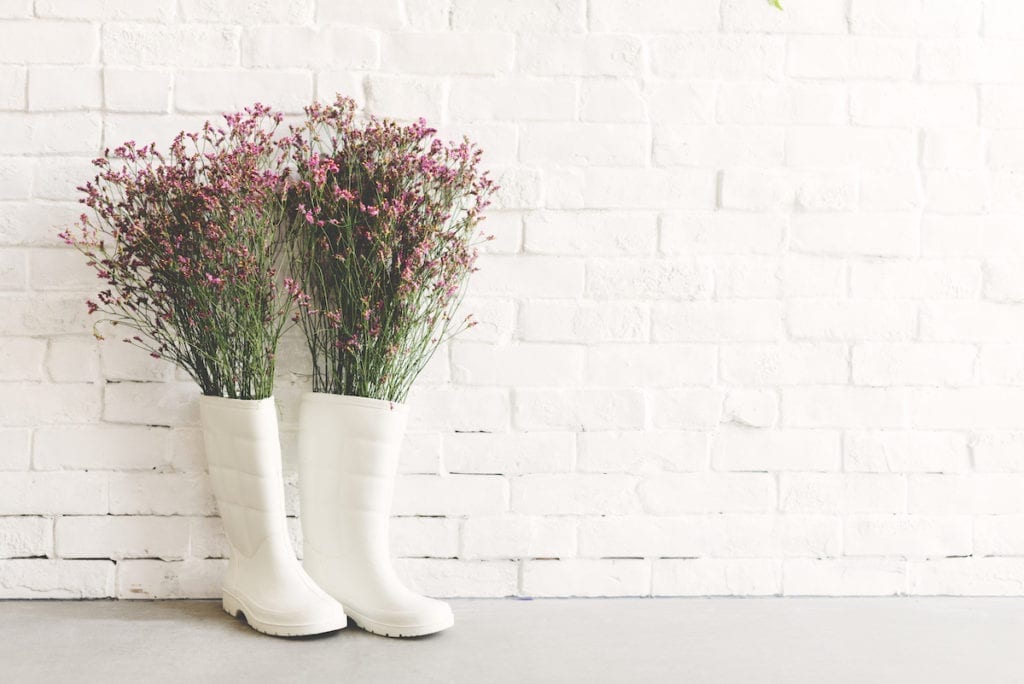 Upcycled rainboot planters